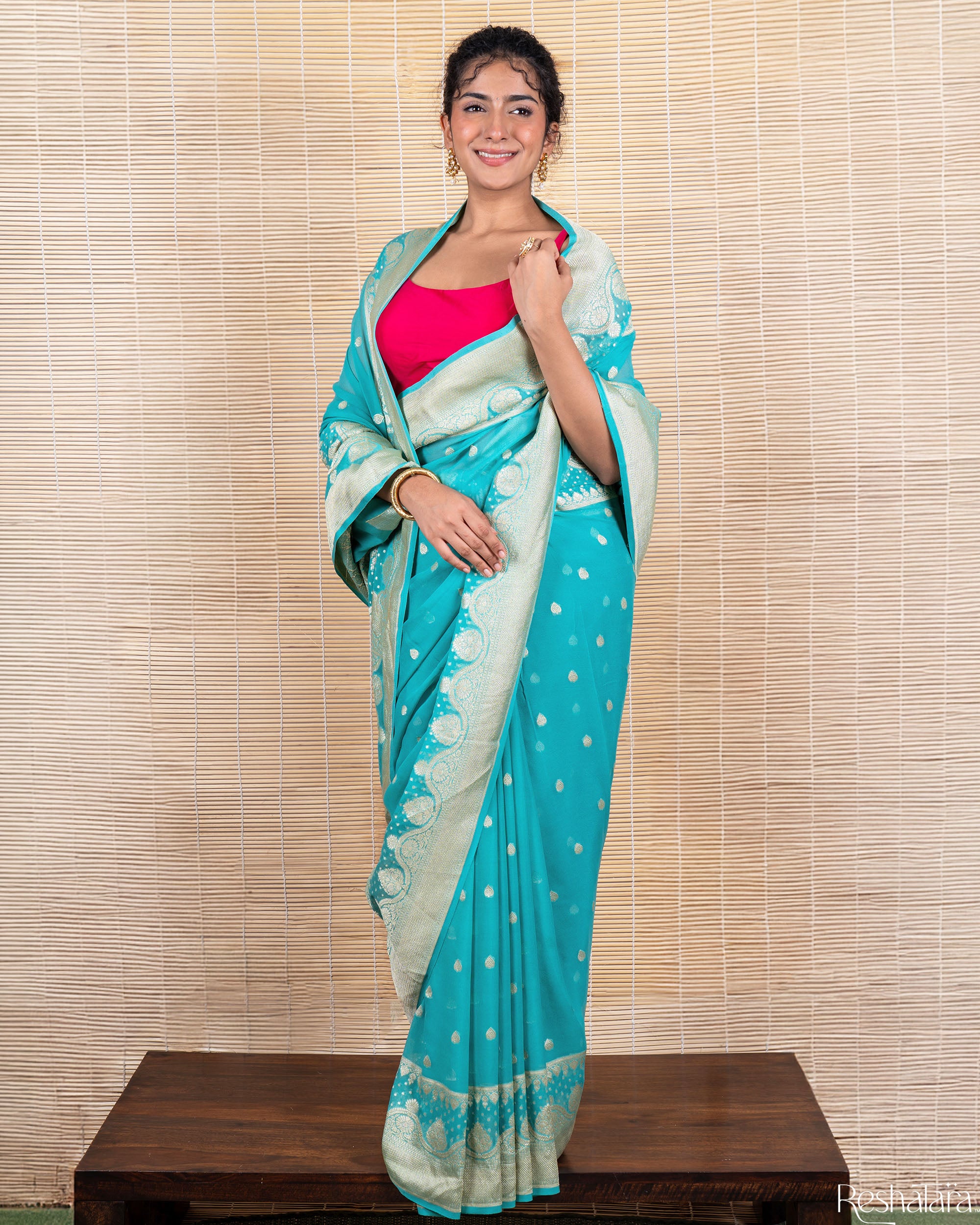 Turquoise Blue Pure Georgette Banarasi Handloom Saree