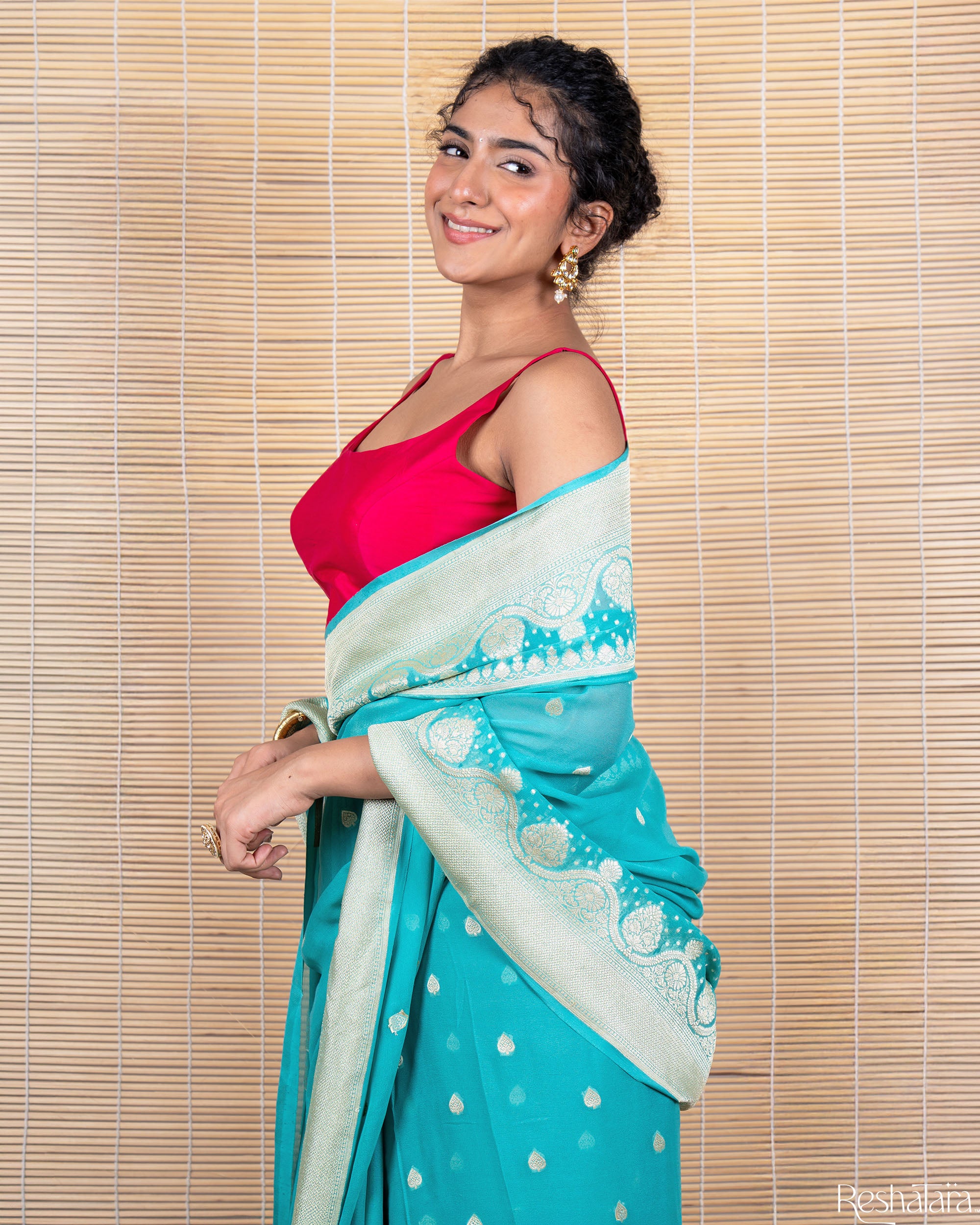 Turquoise Blue Pure Georgette Banarasi Handloom Saree