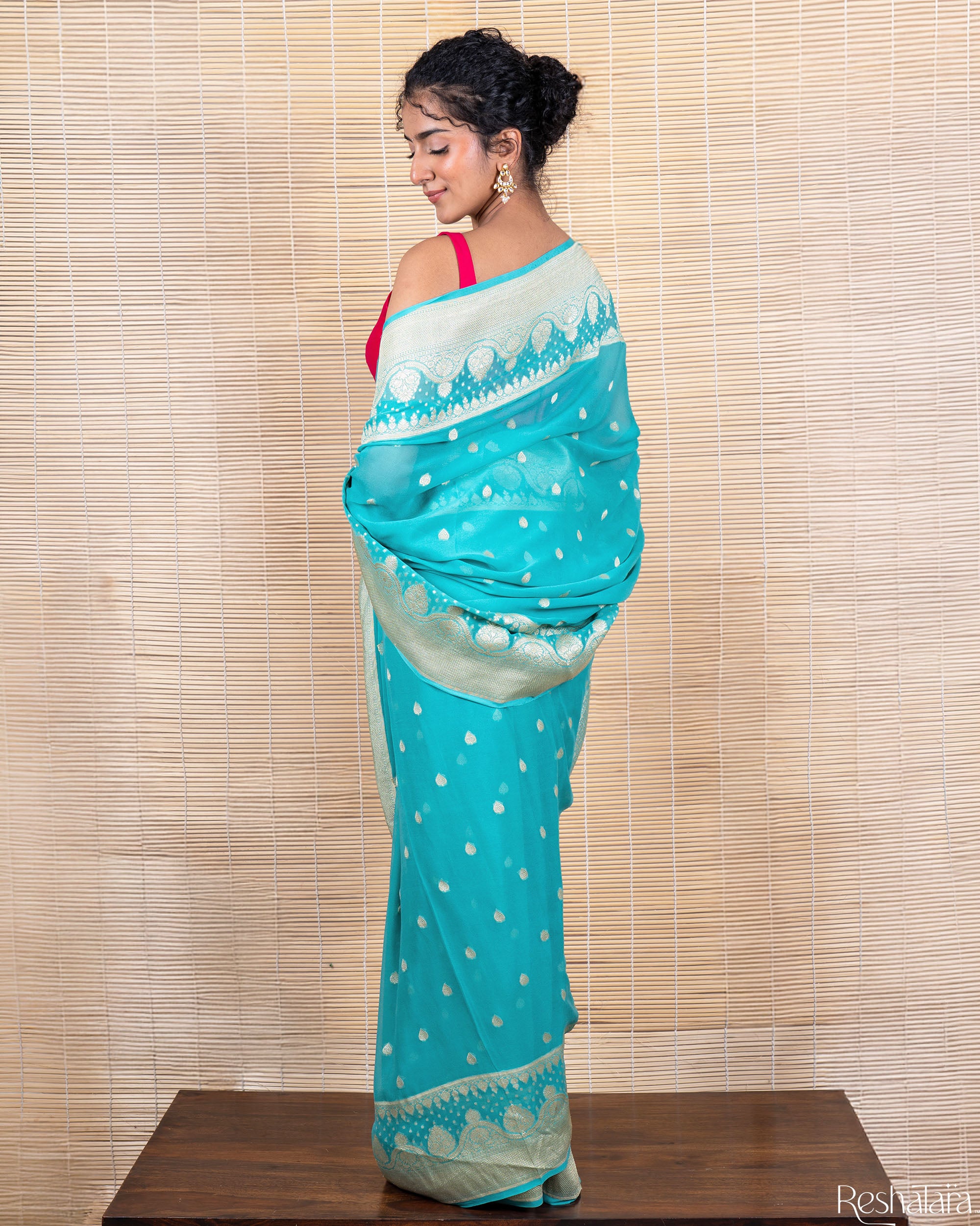 Turquoise Blue Pure Georgette Banarasi Handloom Saree